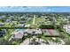 Community features tennis courts, pool, and lush landscaping at 255 West End Dr # 1412, Punta Gorda, FL 33950