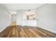 Bright living room featuring laminate floors and a view of the kitchen at 255 West End Dr # 1412, Punta Gorda, FL 33950