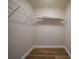 Walk-in closet with wire shelving at 255 West End Dr # 1412, Punta Gorda, FL 33950