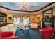 Cozy community library with comfortable seating and a fireplace at 255 West End Dr # 1412, Punta Gorda, FL 33950