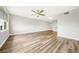 Open living area with wood-look floors and views to other rooms at 255 West End Dr # 1412, Punta Gorda, FL 33950