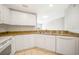White kitchen with granite countertops and stainless steel appliances at 255 West End Dr # 1412, Punta Gorda, FL 33950