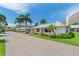 Charming bungalow with a well-manicured lawn and brick driveway at 6300 Midnight Pass Rd # 20, Sarasota, FL 34242