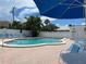 Refreshing pool area with ample seating at 6300 Midnight Pass Rd # 20, Sarasota, FL 34242