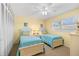 Guest bedroom with two twin beds and built-in closet at 6300 Midnight Pass Rd # 20, Sarasota, FL 34242