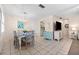 Dining area with table and chairs, kitchen view at 6300 Midnight Pass Rd # 20, Sarasota, FL 34242