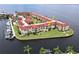 Aerial view of waterfront condo building highlighting unit location at 1 Colony Point Dr # 5C, Punta Gorda, FL 33950