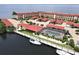 Aerial view of waterfront community with pool, boat slips, and parking at 1 Colony Point Dr # 5C, Punta Gorda, FL 33950