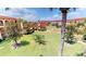 Lush courtyard with manicured landscaping and resort-style buildings at 1 Colony Point Dr # 5C, Punta Gorda, FL 33950