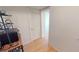 Hallway with laminate flooring and access to other rooms at 1 Colony Point Dr # 5C, Punta Gorda, FL 33950