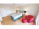 Cozy bedroom with a queen-size bed and sitting area at 1 Colony Point Dr # 5C, Punta Gorda, FL 33950