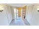 Condo entryway with doors to balcony and closets at 1 Colony Point Dr # 5C, Punta Gorda, FL 33950