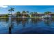 Tranquil canal front view with boats docked, showcasing waterfront living at 2505 Rio Tiber Dr, Punta Gorda, FL 33950