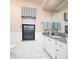 Bathroom with white vanity, tile floor, window, and granite countertop at 2505 Rio Tiber Dr, Punta Gorda, FL 33950