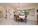 Spacious dining room with ample natural light and seating for six at 2505 Rio Tiber Dr, Punta Gorda, FL 33950