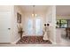 Bright and airy foyer with double doors and decorative rug at 2505 Rio Tiber Dr, Punta Gorda, FL 33950