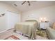 Bright bedroom with a queen-size bed, double doors, and light flooring at 2505 Rio Tiber Dr, Punta Gorda, FL 33950