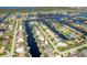 Aerial view of canal-front community with many houses at 2505 Rio Tiber Dr, Punta Gorda, FL 33950