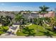 Well-maintained home with a large yard and palm trees at 2505 Rio Tiber Dr, Punta Gorda, FL 33950