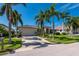 House with palm trees and a spacious driveway at 2505 Rio Tiber Dr, Punta Gorda, FL 33950