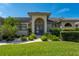 Inviting front entrance with double doors and manicured landscaping, providing great curb appeal at 2505 Rio Tiber Dr, Punta Gorda, FL 33950