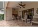 Covered patio with seating area, ceiling fan, and access to the pool area at 2505 Rio Tiber Dr, Punta Gorda, FL 33950