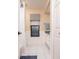 Clean bathroom with white vanity, tile floor, and a window at 2505 Rio Tiber Dr, Punta Gorda, FL 33950