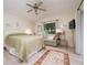 Guest bedroom with queen-size bed and sitting area at 2505 Rio Tiber Dr, Punta Gorda, FL 33950