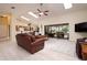 Relaxing living area with leather furniture, high ceilings, and access to pool at 2505 Rio Tiber Dr, Punta Gorda, FL 33950