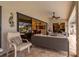 Relaxing covered patio with seating, a fire pit, and access to the interior at 2505 Rio Tiber Dr, Punta Gorda, FL 33950