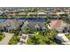 Aerial view of single Gathering home with lush landscaping and canal access at 2505 Rio Tiber Dr, Punta Gorda, FL 33950