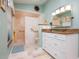 Walk-in shower with grab bars and updated vanity at 2505 Rio Tiber Dr, Punta Gorda, FL 33950