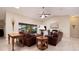 Open living space with vaulted ceilings, leather sofas, and large windows at 2505 Rio Tiber Dr, Punta Gorda, FL 33950