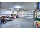 Garage with insulated walls, storage shelves, and room for bikes at 234 Fields Se Ter, Port Charlotte, FL 33952