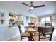 Bright dining area with kitchen pass-through and seating for four at 234 Fields Se Ter, Port Charlotte, FL 33952