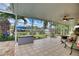 Large screened patio with water views and seating at 234 Fields Se Ter, Port Charlotte, FL 33952