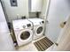 Bright laundry room with Samsung washer and dryer at 234 Fields Se Ter, Port Charlotte, FL 33952