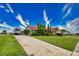 Single-story home with RV parking and mature landscaping at 234 Fields Se Ter, Port Charlotte, FL 33952