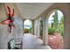 Arched entryway with tile flooring and garden views at 234 Fields Se Ter, Port Charlotte, FL 33952