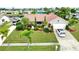 Single-Gathering home with landscaped yard and driveway, offering curb appeal at 234 Fields Se Ter, Port Charlotte, FL 33952