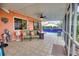 Comfortable patio with seating area near the pool at 234 Fields Se Ter, Port Charlotte, FL 33952