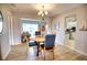 Charming dining room with round table and four chairs, perfect for Gathering meals at 234 Fields Se Ter, Port Charlotte, FL 33952