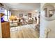 Bright living room with hardwood floors and comfortable furniture at 234 Fields Se Ter, Port Charlotte, FL 33952