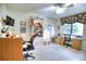 Bright home office features built-in shelving and two desks at 234 Fields Se Ter, Port Charlotte, FL 33952