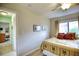 Bedroom with queen-size bed and ceiling fan at 234 Fields Se Ter, Port Charlotte, FL 33952