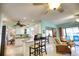 Modern kitchen with stainless steel appliances and an island at 234 Fields Se Ter, Port Charlotte, FL 33952