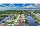 Single-story canal-front home with a large yard and private dock at 234 Fields Se Ter, Port Charlotte, FL 33952