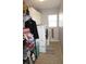 Laundry room with washer, dryer, and shelving for storage at 431 San Felix St, Punta Gorda, FL 33983