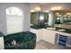 Elegant bathroom with double sinks, a large vanity and a soaking tub at 431 San Felix St, Punta Gorda, FL 33983