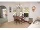 Cozy kitchen dining area with table and four chairs, lots of natural light at 431 San Felix St, Punta Gorda, FL 33983